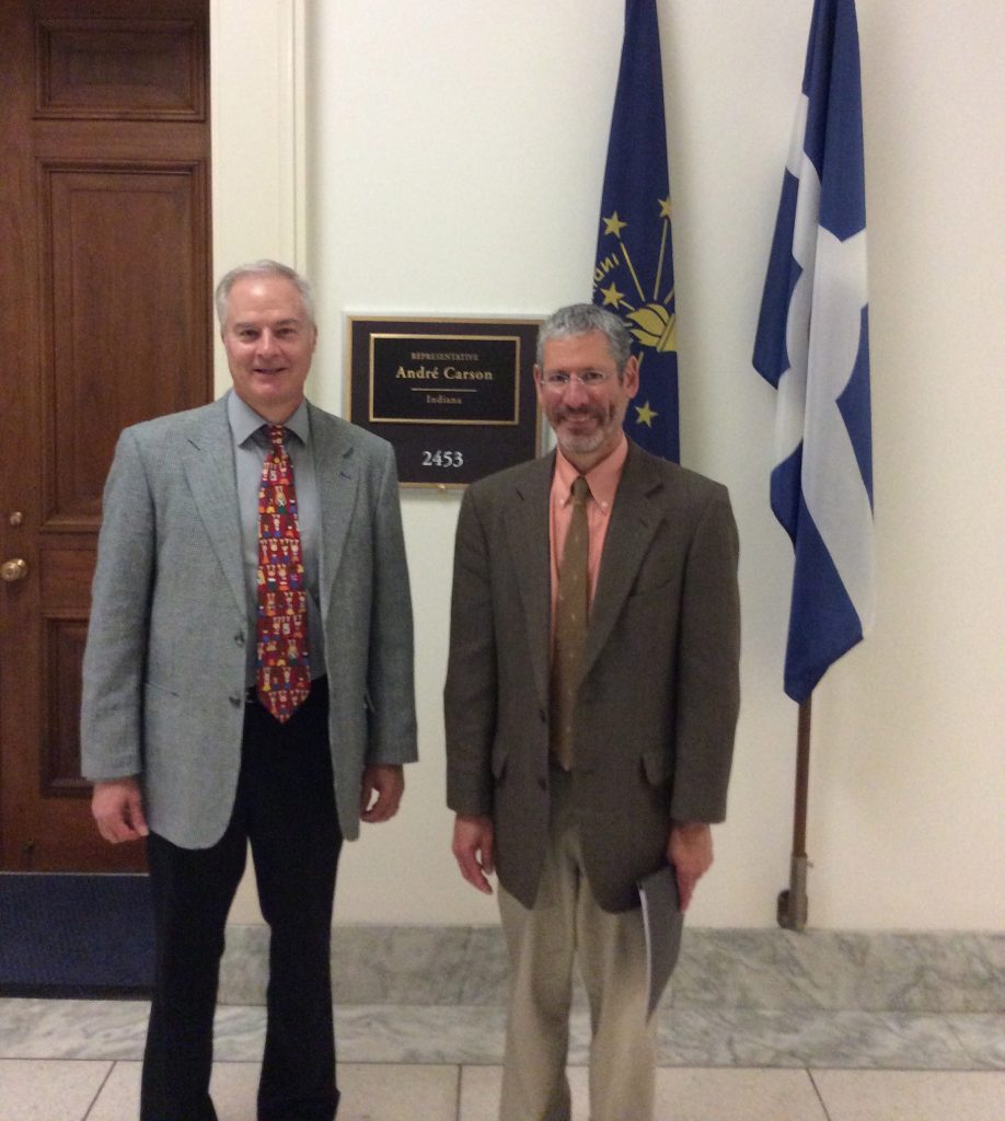 Above, Dr. Conway and colleague Dean Blumberg, MD, visited Washington, DC, in July 2014 to advocate for worldwide vaccine access.