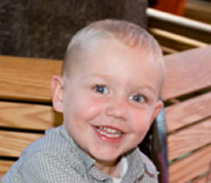 Tyler is now happy and healthy after receiving live-saving treatment for a rare enzyme deficiency.