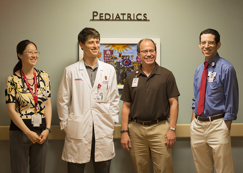 From left: UW family medicine residents Lydia Chen, MD, and Jared Dubey, DO, with Jonathan Fliegel, MD, and Daniel Sklansky, MD, at the St. Mary’s inpatient pediatrics unit.